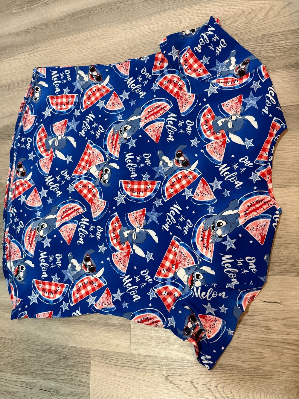 Disney royal blue scrub top with red and white watermelon motif - Picture 3 of 3